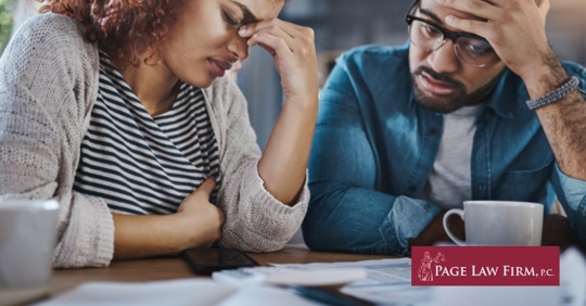 grieving family looking at finances